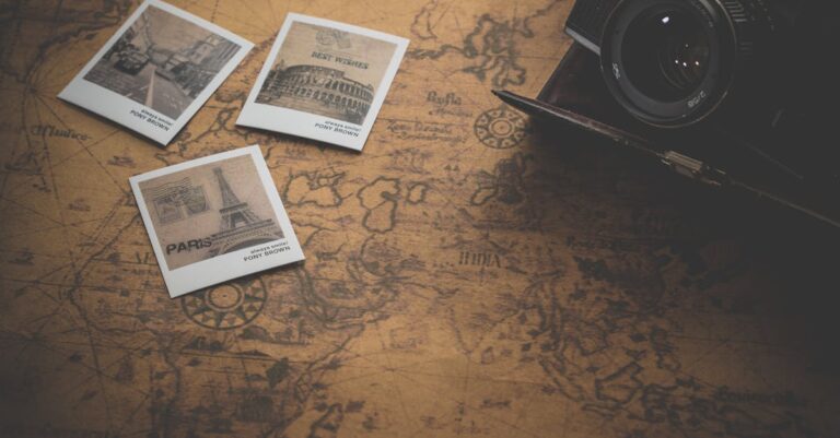 Vintage style still life with a camera, map, and travel photos. Perfect for travel enthusiasts.